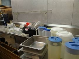 Lot of misc. plastic pitchers, utensils, sugar pac ...