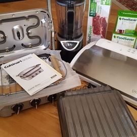 Wide assortment of small kitchen appliances, including high-end Food-Saver (with supplies), Cuisinart grill, Ninja blender, and many more.