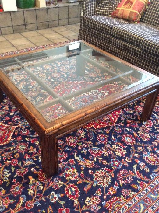 More rugs and glass top coffee table