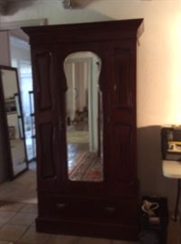 Mirrored armoire