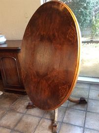 Gorgeous tilt top table with marquetry.