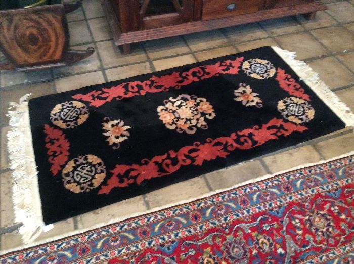 Asian motif  "carved"  wool rug  Black/rust/earth tones.  5'7" x 31"