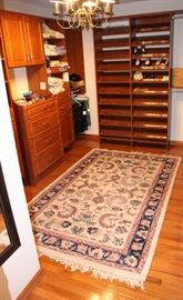 This closet has tablecloths, hats, towels, bedding, size 8 and a half ladies clothing, silk scarves and winter apparel.