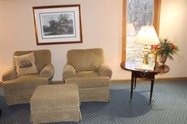 Two club chairs with ottoman.