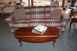 Sofa sleeper and drop leaf coffee table.