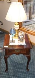 End table with lamp.