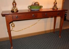 Front of small table.