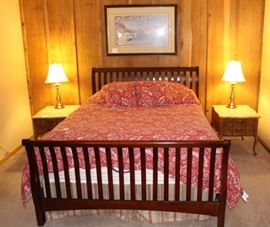 Sleigh type bed with marble top end tables. We have the matching coffee table to these Hammary tables.