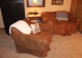 Slip covered chair and settee.