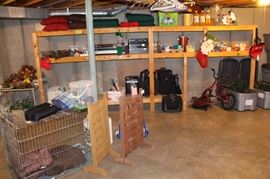 Large dog kennel, electronics, luggage, and much more.