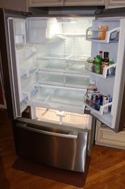 Inside view of Whirlpool refrigerator.