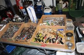 Table is full of misc. hand tools.