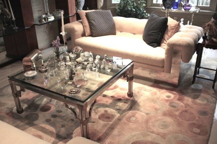 Pair of Chrome and Cloth Sofas, Chrome and Glass Coffee Table, Accent Pillows and lots of Small Decorative Items such as Swarovski & Lalique