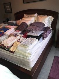 King size bed displaying linens
