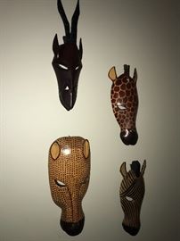 Carved "Souvenir"-type African animal masks