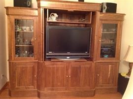 This is a beautiful Handmade entertainment center,made by the owner of the house out of wood he brought down from his tree farm up north...it is absolutely gorgeous