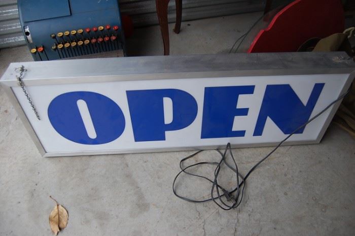 Old open sign, lighted