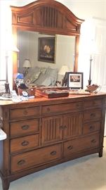 Dresser and mirror matches night stands and chest of drawers