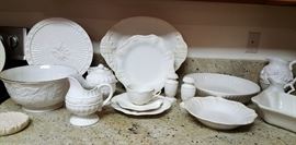 Large Wedgewood bowl, Lenox dishes plates, platters, bowls, salt and pepper, creamer, sugar, cup and saucer and dessert plates.
