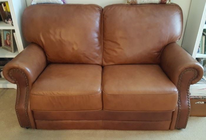 Nice brown leather loveseat with nailhead trim