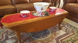 Oval oak drop leaf coffee table 