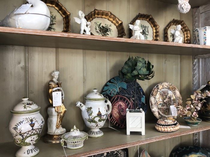 Eglomise placques, vintage pottery, seashell accents.