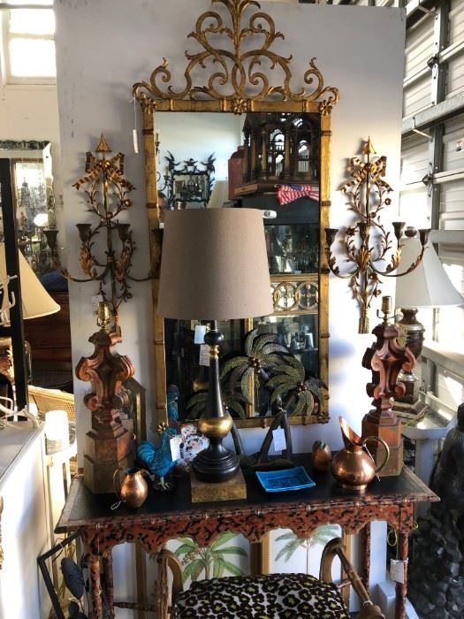 Palladio gilded iron mirror, over faux tortoise painted console.