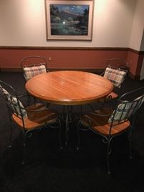 ROUND OAK TABLE WITH METAL BASE AND 4 CHAIRS (COMES WITH LEAF) -62"L x 43"W x 30"H 