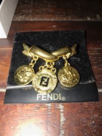 GOLD TONE FENDI BROOCH