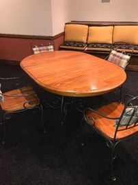 ROUND OAK TABLE WITH METAL BASE AND 4 CHAIRS (COMES WITH LEAF) -62"L x 43"W x 30"H 