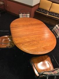 ROUND OAK TABLE WITH METAL BASE AND 4 CHAIRS (COMES WITH LEAF) -62"L x 43"W x 30"H 