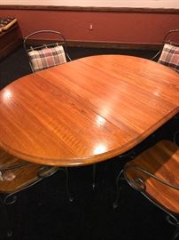 ROUND OAK TABLE WITH METAL BASE AND 4 CHAIRS (COMES WITH LEAF) -62"L x 43"W x 30"H 