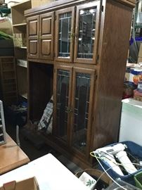 Large wood cabinets with glass doors 
