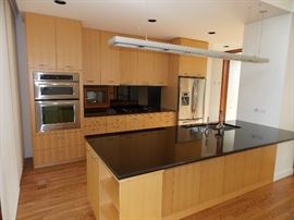 Maple Custom Kitchen Cabinets , Stainless Steel Oven W / Built In Microwave 30" x 42" , GE Profile 5 Burner Cooktop
, 36" Gaggenau Hood , Sorry NO Dishwasher & Refrigerator Opening Size 36" x 70"
 , Black Granite Countertop ,  Island , Stainless Steel Double Sink