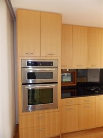 Maple Custom Kitchen Cabinets , Stainless Steel Oven W / Built In Microwave 30" x 42" , GE Profile 5 Burner Cooktop
, 36" Gaggenau Hood , Sorry NO Dishwasher & Refrigerator Opening Size 36" x 70"
 , Black Granite Countertop ,  Island , Stainless Steel Double Sink