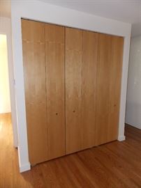 Custom Maple Bifold Closet Doors and reclaimed red oak wood floors
