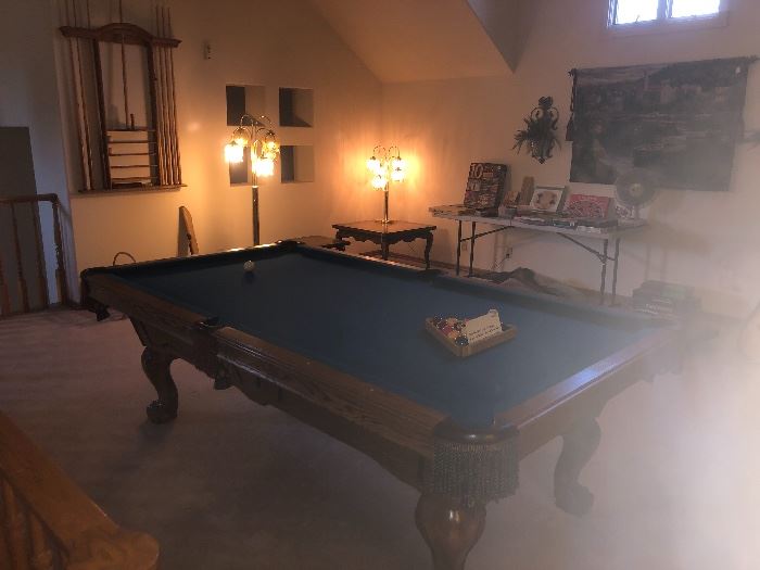 All accessories are included with the purchase of this fine pool table.