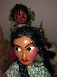 THIS DOLL DOESN'T LOOK HAPPY THAT WE ARE GOING TO SELL HER FRIENDS... LOL!