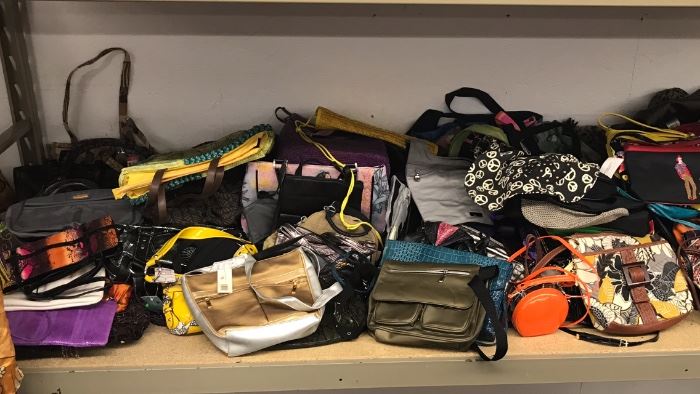 Over 50 Purses & Bags to choose from (some w/tag) 
Now Only $1-$2