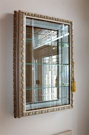 Wall curio display case from Neiman Marcus