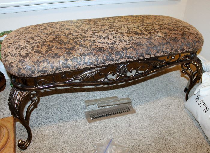 Upholstered iron bench