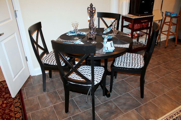 Black round table and 4 chairs