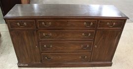 Mahogany Banded Buffet by “Henkel Harris Furniture”
Located Inside – Auction Estimate $200-$600
