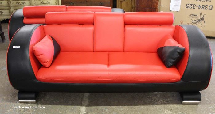 2 Piece Leather Modern Design Sofa and Loveseat in the Ferrari Red and Black
Located Inside – Auction Estimate $400-$800
