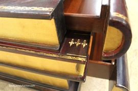 BEAUTIFUL 3 Drawer Leather Wrap Book Coffee Table by “Maitland Smith Furniture”
Located Inside – Auction Estimate $1000-$2000
