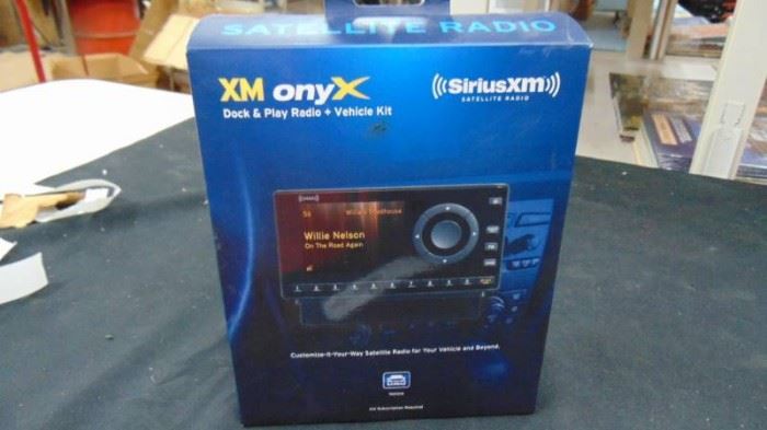 XM radio receiver in box
