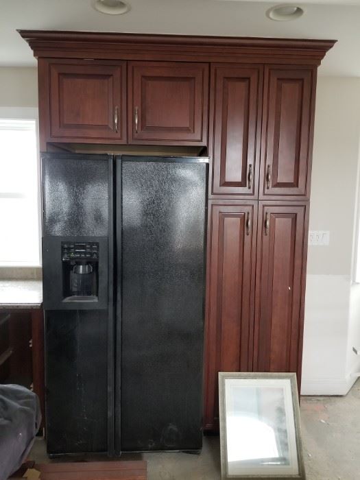 Refrigerator not included; detail to show cabinet configuration