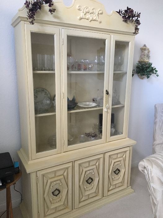 Glass front cabinet that is lighted