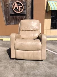 Leather Power Recliner; Functional; Damage on the Right Arm (In Pictures); Sold AS IS; 33"W x 40"D x 40"H; $100; ref #: 904