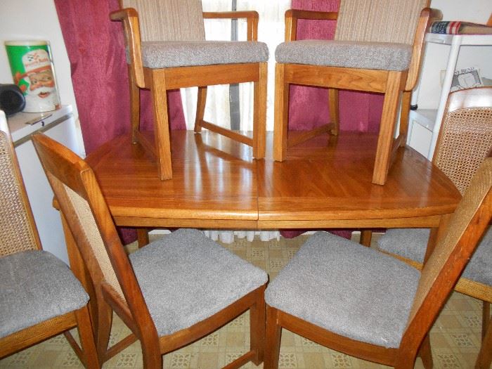 Solid wood dining table with 2 leaves and 6 chairs